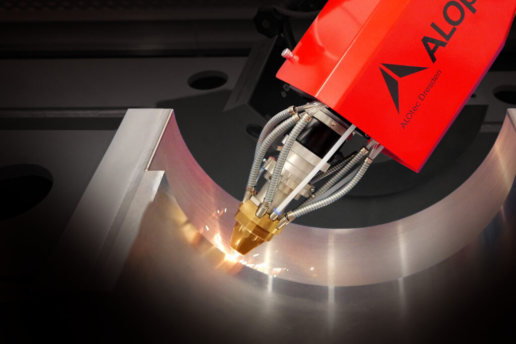 Stationary laser system repairs a bearing seat with cladding