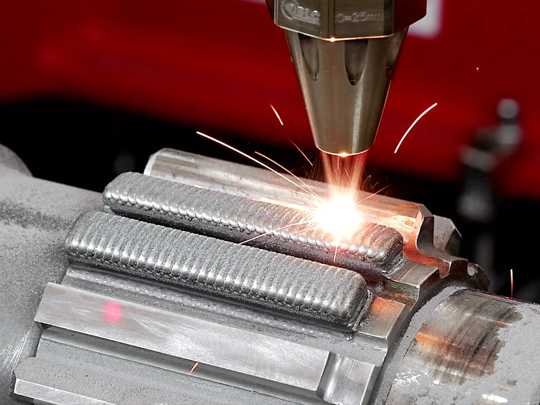 Repair and additive manufacturing of a pinion shaft with reconstruction of the gear teeth using laser cladding